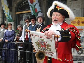 Town crier Chris Whyman kicks off Monday's downtown ceremony to announce details around Tourism Awareness Week. Kingston residents are being encouraged to become tourists in their own city.
Michael Lea The Whig-Standard