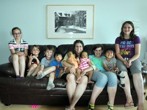 With nine children, including four adopted from Vietnam with special needs, the Wagner family recently received a donation of a central air conditioning system. From left: Grace, Noah, Liam, Toan, Phuoc, Johanne, Binh, Rose, Logan, Fiona.
Supplied photo