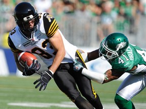 Ticats receiver Andy Fantuz (left) has been reunited with coach Kent Austin. The two won a Grey Cup with Saskatchewan in 2007. (REUTERS)