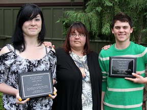 Jaime Bray, l6, left, and Grant Bray, 15, received Hero Awards during the fifth annual Safety Awards, presented by the Chatham-Kent Children's Safety Village, for their efforts to help save their mother, Mary, who nearly died of a heart attack last October. They received their awards along with several other youth during a ceremony on Monday, June 10, 2013 in Chatham, Ont.

ELLWOOD SHREVE/ THE CHATHAM DAILY NEWS/ QMI AGENCY