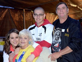 Alisha and Shirley Crockett, Brad Long and Ron Jaumol at Tillsonburg's 12th annual Relay for Life Friday night at Annandale School. CHRIS ABBOTT/TILLSONBURG NEWS