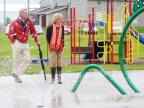 Municipality of Brighton councillors Craig Kerr and Mary Tadman check out Brighton's new splash pad in King Edward Park. Mayor Mark Walas, councillors, members of the Rotary Club of Brighton and members of the community took part in an official ribbon cutting Friday.

Emily Mountney Trentonian