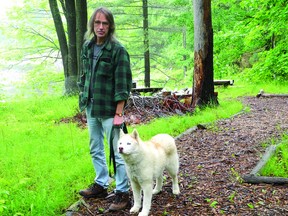 Oliver Reichl and his dog, Chance, have had many encounters with deer ticks around his home in Mallorytown Landing or while at work in the Thousand Islands.        Contributed photo