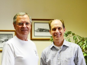 Pictured is Mike Bolton (right) of BDO handing over a cheque worth $4,590 to chair of the Rotary Huron Shore Run committee John Van Bastelaar.