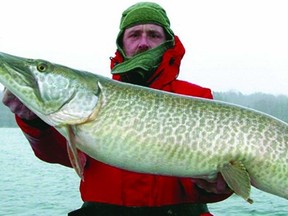 A happy angler displays his catch near Gananoque.       Contributed photo