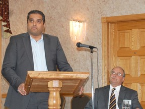 The Penetangore Regional Economic Development Corporation (PREDC) hosted a meet and greet at the Best Western Plus Govenor's Inn on June 4, 2013. Gerry Taylor (R), executive director for PREC, looks on as Arif Ismail, managing partner of the Legacy Hospitality Management and Development Inc., announced the creation of a new TownPlace Suites Marriot hotel in Kincardine. (ALANNA RICE/KINCARDINE NEWS)