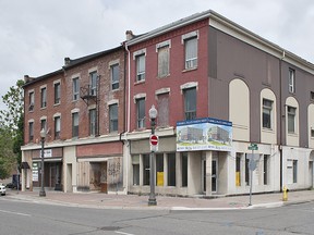 The developer of this property at 48-50 Colborne Street in downtown Brantford says the brick facade cannot be saved, but will be demolished and rebuilt in the same style. Brantford's community services committee has recommended changes so the developer can keep a $308,500 performance and facade grant. (BRIAN THOMPSON Brantford Expositor)