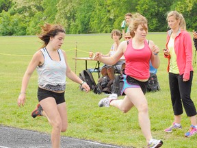 SARAH DOKTOR Times-Reformer
Boston Public School students Dakota Coleman and Rachael McClay finished first and second during the senior girls' 100 metre race at the Norfolk Public School Athletic Association's Track and Field Meet in Port Dover on Tuesday.