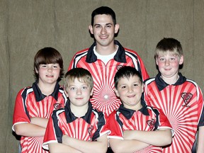 Bowlers from Echo Bowl in Brantford are YBC national bantam five-pin champions. Posing with coach Cam Flannigan are team members Blake Bryan (left), Sam Dean, Zackary Jeanes and Cole Moulton. (Submitted Photo)