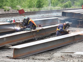 Preparation work is underway to replace a damaged bridge with a new one in the Wanup, ON. area on Tuesday, June 11, 2013. The bridge was damaged when 11 CP Rail cars carrying 24 containers were involved in a derailment on June 2. Five rail cars and 12 containers ended up in the Wanapitei River. JOHN LAPPA/THE SUDBURY STAR/QMI AGENCY