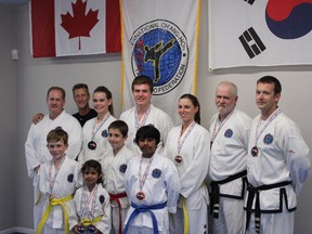 The Woodstock Taekwondo Club won 15 medals at the John Lemieux Memorial Tournament last month in London. Eleven people competed, included four at their first tournament.
(Front row LtoR): Blake Bruce, Zarah Lakhani, Andrew Mayberry and Shakeel Lakhani. (Back row LtoR): Darcy Bruce, Master Don Simard, Teralyn Roloson, Dalton Pears, Kelly Bell, Kevin Noe and Chad Parker. Missing is Pierre Babin

(GREG COLGAN/QMI Agency/Sentinel-Review)