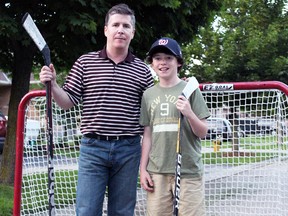 Jeff Gilson (left) and his son Cooper (right) hope to see the Safe Rep hockey league come to Oxford County, so he can continue playing hockey at a competitive level without checking. Already with two concussions, the non-contact option would let Cooper continue playing hockey in bantam without checking. GREG COLGAN/QMI Agency/Sentinel-Review