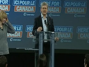 Stephen Harper's wife, Laureen, tells him to get serious while the prime minister does impressions of those who held the post before him. (YouTube screenshot)