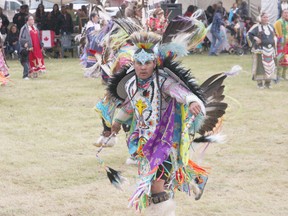 Michaela Hiebert/R-G
Larson Yellowbird dances energetically despite the light rain that fell on the Peace River Pow Wow at the Agricultural Grounds on June 8. For more photos from the event pick up the paper.