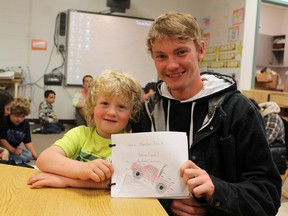 North Ward Public School Kindergarten student Van Langille, left, is the star of the story written by James Chambers, a Writer's Craft student at Paris District High School. MICHAEL PEELING/The Paris Star/QMI Agency
