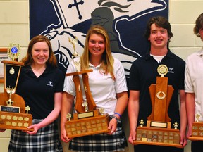 Pictured left to right are St. Mary Catholic High School athletes of the year Shannon Greer (senior girls), Carter King (junior girls), Tanner DeJong (junior boys) and Alex Boswall (senior boys). (STEVE PETTIBONE The Recorder and Times)