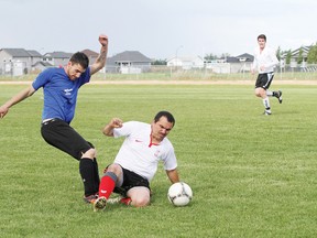 Diablos FC defender Jose Acosta Sr. tackles the ball away from Ponoka’s Glyn Thomas during men’s league action in Wetaskiwin June 9.