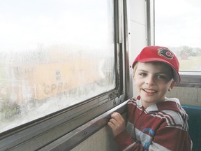 Cody Schimpf of Ponoka enjoys his view from the caboose during a train ride at the Alberta Central Railway Museum June 9.