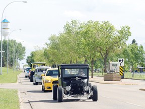 Cars of all eras, from 1903 to modern day, took a cruise down Highway 2A and through the city June 8 during the History Road: The Ultimate Car Show event.