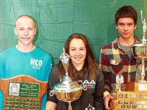 Roland Michener Secondary School honoured its top athletes during a ceremony on Tuesday morning. Among the RMSS athletes receiving awards were John Mavrinac, left, who took home the Frank Sebalj Memorial Award, Amelia Cosco, who took home the Female Athlete of the Year Award and Ben Anderson-Sackaney, who took home both the Athletic Scholar Award and the Male Athlete of the Year Award.