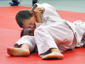 Quinte Judo Club's Paul Bunge pins an opponent this past weekend at the Ajax Budokan Judo Clubís monthly tournament.