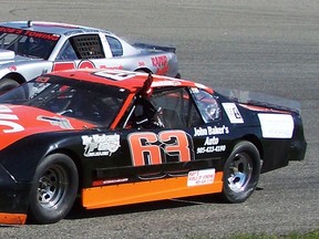John Baker Jr. battles for position with Bob Kish during Bob's Towing Thunder Car action at Canadian Tire Motorsport Park Speedway. After a one-week layoff, the division will be back in competition this Saturday.