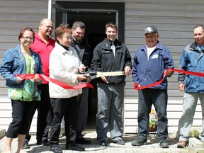 Whitefish River First Nation council, owners of Helios Development were joined by community members to open the newest addition in their growing renewable energy business.  
Photo by Dawn Lalonde/Mid-North Monitor/QMI Agency