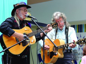 SEAN CHASE William Brunette, accompanied by Roy Jones (right), performs during the seventh annual Chartwell Senior Star competition held at the Pembroke Mall Wednesday.