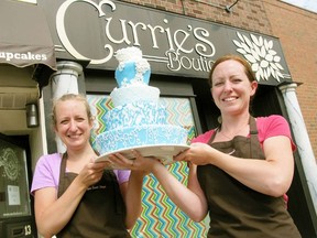DANIEL R. PEARCE Simcoe Reformer
Sheila Grace (left) and Rachel McFarland of McFarland's Old Tyme Sweet Shop in downtown Simcoe is expanding next door into the former Currie's women's boutique. Business has been booming, said McFarland.
