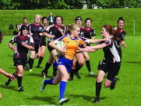 The Bev Facey Falcons won their second consecutive Metro Edmonton League Premier Conference senior girls rugby title with a 42-12 victory over the Bellerose Bandits. Photo by Shane Jones/Sherwood Park News/QMI Agency