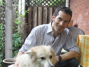 Kingston author Steven Heighton, with his dog Isla.
Michael Lea The Whig-Standard