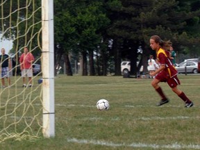 Ashley Docherty of the Woodstock FC Cosmos lines up her kick before scoring on the Byron Bullets in an August 2012 game at Cowan Park. The Cosmos are one of nine Woodstock teams vying for championships at the 23rd annual Walter Kirchner tournament this weekend.

GREG COLGAN/Sentinel-Review/QMI Agency