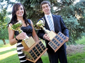 Wallaceburg's Alicia Baertsoen, left, and Lambton-Kent's Alex Kiar show their Dr. Jack Parry Awards as the top graduating student-athletes in Chatham-Kent after Thursday's awards ceremony at the Ursuline College Chatham theatre. (DIANA MARTIN/The Daily News)