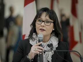 Federal health minister Leona Aglukkaq speaks to media, on Wednesday, Feb. 20, 2013. (QMI Agency/Lyle Aspinall)