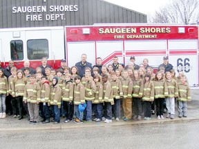 Forty students participated in this year’s Junior Fire Fighter Program in Saugeen Shores. The program was six weeks long with a graduation night which was held on May 29. There were four modules for the kids aged 9-11 to participate in which included a smoke house and fire extinguisher, auto ex, pumpers and hoses, and EMS first aid. Saugeen Shores Fire Department is proud to announce the Jr. Firefighters for 2013.