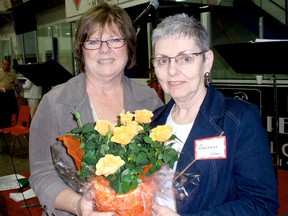 Chatham-Kent councillor Karen Herman congratulates Susanne Drew of Merlin on being named CK senior of the year for 2013. Drew was one of more than 50 seniors recognized during the annual Chatham-Kent Seniors' Information Fair in Blenheim. BOB BOUGHNER/ THE CHATHAM DAILY NEWS/ QMI AGENCY