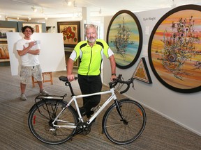 Painter Kyle Haight (left) and cyclist Joachim Ostertag.