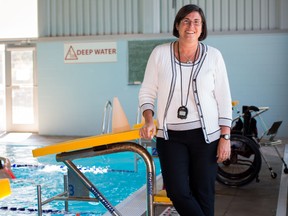 Vicki Keith stands alongside the pool at the YMCA of Kingston. A special event is being held Saturday to mark the 25th anniversary of her crossing of all five Great Lakes in the summer of 1988.
Sam Koebrich/For the Whig-Standard