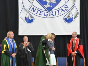 Alison Irons accepts a degree from Nipissing University for her daughter, Lindsay Wilson, who was murdered on April 5 by an ex-boyfriend.