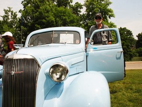 Al Pimlatt of St. Thomas shows off his restored '37 Chev sedan at the Lions Club of St. Thomas Autofest car show last year at Pinafore Park.
(Times-Journal file photo)