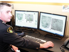 The South Porcupine detachment of the OPP formally unveiled its new, state-of-the-art Forensic Identification Services facility on Friday. During a tour of the facility, Const. Vern McLean demonstrated new fingerprint identification technology being used in the facility.