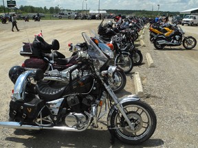 Lines of motorcycles parked Friday, as the 41st Canadian Vintage Motorcycle Group's National Ralley got underway at the Paris Fairgrounds. It runs June 14-16, 2013. (HUGO RODRIGUES Brantford Expositor)