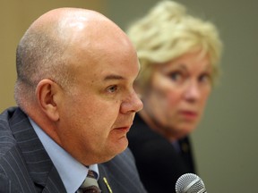 Minister Fred Horne (l) announces new top administrator Janet Davidson to the media at the Royal Alexandra Hospital in Edmonton, Alberta Thursday, June 14 , 2013.  Perry Mah/Edmonton Sun/QMI Agency