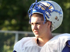 Sudbury Gladiators offensive tackle Spencer Dailey listens to coaches during practice on Thursday.