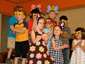 Kindergarten students from Pope John Paul II School perform their Spring Into Summer Concert on Friday, June 14, 2013.
MARNEY BLUNT, Daily Miner and News