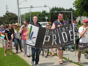 Gay Pride walkers on Colborne Street