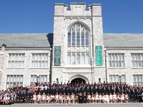 Forty two Albert College students from 13 different countries around the world — Germany, Hong Kong, Bermuda, Bahamas, Japan, Turkey and Nigeria, to name a few — pose for the traditional "family photo" with staff members, prior to the private highs school's 156th Convocation ceremony in Belleville, Ont. Saturday morning, June 15, 2013. In addition to high school diplomas, the ceremony held in the college courtyard and led to the sound of bagpipes also featured the presentation of awards for graduates and students (Grade 7 to 11).  JEROME LESSARD/The Intelligencer/QMI Agency