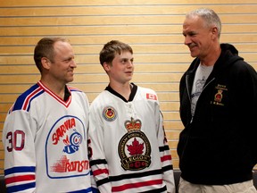 The Sarnia Legionnaires have signed forward Jordan Fogarty, centre, to a contract. Picured with him on the left is his father, Ron, who played Jr. 'B' hockey in Sarnia two decades ago, and Legionnaire assistant coach Bob Farlow. (Anne Tigwell, Special to the Observer)
