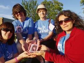 Fighting for Frieda, a team from Oxford CAS, participated in the Woodstock Relay for Life in honour of Frieda Schmidt who died in 2012.  From left Marg Olson, Rose Schmidt, Herda Schmidt and Giselle Lutfallah. HEATHER RIVERS/WOODSTOCK SENTINEL REVIEW