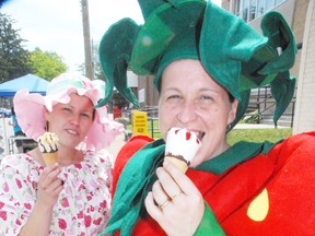 DANIEL R. PEARCE Simcoe Reformer
Tabitha Alward (left), 24, dressed as the "Strawberry Shortcake" character while Leana Serrador was a giant strawberry during Delhi's fifth annual Strawberry Festival in this file photo from 2013.